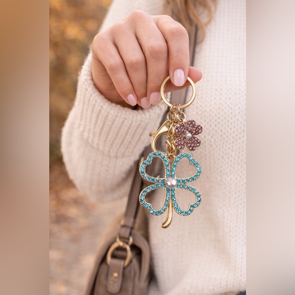 Gold and Blue Rhinestone Keychain with pink clover. New